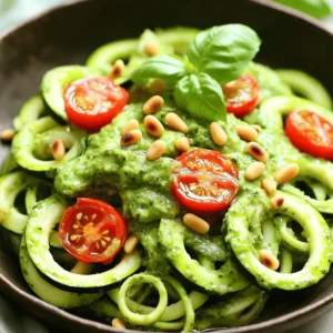 To make zesty zucchini noodles with pesto, you need: - 2 large zucchinis, spiralized - 1 ripe avocado, pitted and peeled - 1 cup fresh basil leaves - 2 tablespoons lemon juice - 2 tablespoons olive oil - 1 small garlic clove, minced - Salt and pepper to taste For this recipe, you will want to have: - A spiralizer for the zucchini - A food processor for the pesto - A mixing bowl for combining - A knife and cutting board for prep You can enhance the dish with these: - Cherry tomatoes, halved (for garnish) - Toasted pine nuts (for garnish) Feel free to explore these extras to make your meal special. Each adds flavor and texture, making your dish even more delightful. For the complete recipe, check the Full Recipe section. To start, grab two large zucchinis. I find that thicker zucchinis work best. Use a spiralizer to turn them into noodles. It’s fun to watch them twist into shape! Place the spiralized noodles in a large mixing bowl. Set them aside for now. Next, let’s make the avocado pesto. Take one ripe avocado and remove the pit. Peel it and place it in a food processor. Add one cup of fresh basil leaves, two tablespoons of lemon juice, and two tablespoons of olive oil. Toss in one small minced garlic clove, plus salt and pepper to taste. Blend until smooth and creamy. If it’s too thick, add a splash of water. This pesto is rich and full of flavor! Now it’s time to combine everything. Pour the avocado pesto over the spiralized zucchini noodles. Gently toss the noodles until they are well coated. Make sure every noodle gets some pesto! Serve the noodles on plates, and top with halved cherry tomatoes and toasted pine nuts. A drizzle of olive oil adds a nice finish. Enjoy your fresh and flavorful meal! If you want the full recipe, check out the details above. To make great zucchini noodles, start with firm zucchinis. Look for ones that are bright and smooth. Spiralize them just before cooking. This helps keep them fresh. Avoid overcooking; just a few minutes will do. You want them tender but not mushy. A quick sauté can add warmth without losing crunch. A little zest can elevate your pesto. Add more lemon juice for brightness. You can also toss in a pinch of salt to bring out flavors. If you love cheese, try adding a bit of parmesan. This will make your pesto rich and creamy. Don't forget to taste! Adjust seasoning based on your preference. Serve your zucchini noodles in a shallow bowl for a nice look. Top with halved cherry tomatoes for color and flavor. A sprinkle of toasted pine nuts adds a great crunch. You can also drizzle more olive oil for richness. If you want more flavor, add a small dollop of pesto on the side. This makes it fun and interactive. For the full recipe, check out the Zesty Zucchini Noodles with Avocado Pesto. {{image_2}} You can switch up the pesto easily. Instead of avocado, try using nuts. Pine nuts, walnuts, or almonds all work well. You can also use different greens. Spinach or arugula can add a nice twist. For a spicy kick, add some chili flakes to your pesto. Each change can create a new flavor for your dish. Want to make your meal heartier? Add some protein! Grilled chicken or shrimp pairs great with zucchini noodles. You can also add beans for a plant-based option. If you want more veggies, consider adding bell peppers or carrots. They add color and crunch. Mix and match to find your favorite combo. This dish is naturally gluten-free. Zucchini noodles are a great swap for pasta. For a vegan option, ensure your pesto has no cheese. You can use nutritional yeast for a cheesy flavor without dairy. This way, everyone can enjoy a tasty and fresh meal. Try these variations to keep your zucchini noodles exciting! For the full recipe, check out the details above. To keep your leftover zucchini noodles fresh, place them in an airtight container. Make sure to remove as much air as possible. Store them in the fridge for up to two days. If you notice any moisture, pat the noodles dry with a paper towel. This helps prevent sogginess. For your leftover pesto, use a small jar or container. Pour a thin layer of olive oil on top to keep it fresh. Seal the container tightly and store it in the fridge. Use the pesto within five days for the best flavor. You can freeze pesto, too. Pour it into ice cube trays for easy portions. Once frozen, transfer the cubes to a freezer bag. When reheating zucchini noodles, avoid the microwave if possible. It can make them soggy. Instead, heat a non-stick pan over medium heat. Add a small amount of olive oil. Toss the noodles in the pan for just a minute or two. Heat until warm, but be careful not to overcook. Remember, zucchini noodles cook faster than regular pasta. Enjoy your meal fresh! For the full recipe, check out the Zesty Zucchini Noodles with Avocado Pesto. Yes, you can make this dish ahead of time. Make the pesto and store it in the fridge. Spiralize the zucchini and keep it in an airtight container. Mix them together just before serving. This helps keep the noodles fresh and crunchy. You can use other veggies if you don’t have zucchini. Some great options are carrots, sweet potatoes, or cucumbers. Just spiralize them like you do with zucchini. Each option gives a different taste and texture. To keep zucchini noodles from getting soggy, follow these steps: - Salt the Zucchini: Sprinkle salt on the noodles and let them sit for 10 minutes. This helps draw out extra moisture. - Pat Dry: Use a paper towel to gently pat the noodles dry after salting. - Quick Cooking: If you cook them, do it quickly. Sauté for just 2-3 minutes to keep them firm. For the full recipe, check out the Zesty Zucchini Noodles with Avocado Pesto. Enjoy your healthy meal! This blog post covered essential ingredients, step-by-step instructions, and handy tips for making zucchini noodles with avocado pesto. You learned how to spiralize zucchini, create a tasty pesto, and combine them perfectly. We shared fun variations and storage tips too. Remember, you can adapt this dish to fit your taste and needs. Enjoy experimenting with flavors and make it your own! It’s simple, healthy, and delicious. Dive into this dish and have fun!