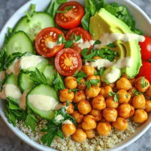 - 1 can (15 oz) chickpeas, drained and rinsed - 2 tablespoons olive oil - 1 teaspoon smoked paprika - 1 teaspoon cumin - 1/2 teaspoon garlic powder - Salt and pepper to taste - 2 cups cooked quinoa - 1 cup cherry tomatoes, halved - 1 cucumber, diced - 1 avocado, sliced - 2 cups mixed greens (spinach, kale, or arugula) I love using chickpeas in this bowl. They are rich in protein and fiber. The olive oil and spices add a nice flavor. I prefer smoked paprika for a bit of depth. Cumin gives it warmth, while garlic powder adds a nice touch. Quinoa is another star here. It’s a great base and is full of nutrients. I often use cooked quinoa as my starting point. Fresh veggies like cherry tomatoes, cucumbers, and avocado bring color and crunch. Mixed greens add freshness and balance the dish. - 1/4 cup tahini - 2 tablespoons lemon juice - Water (to thin the tahini dressing) - Fresh parsley, chopped (for garnish) I like to make a simple tahini dressing. Just mix tahini with lemon juice. Add water to make it smooth and pourable. This dressing ties the bowl together. Fresh herbs, like parsley, brighten it up. You can also add nuts or seeds for extra crunch. For more ideas, check out the Full Recipe. - Preheat your oven to 400°F (200°C). - Grab a baking sheet and line it with parchment paper. - Open the can of chickpeas, then rinse and drain them well. - In a bowl, toss the chickpeas with olive oil, smoked paprika, cumin, garlic powder, salt, and pepper. - Make sure each chickpea is coated in the oil and spices. - Spread the chickpeas out in a single layer on the baking sheet. - Roast them for about 25-30 minutes until they turn crispy and golden. - Toss them halfway through cooking for even crispiness. - In a serving bowl, start with a layer of cooked quinoa as your base. - Next, add mixed greens like spinach or kale on top of the quinoa. - Arrange the halved cherry tomatoes and diced cucumber next. - Slice the avocado and place it in the bowl too. - Once the chickpeas are ready, sprinkle them over the fresh veggies. - Drizzle the tahini dressing over the top and garnish with fresh parsley. For more detailed preparation, check the Full Recipe. Enjoy your tasty and nutritious meal! To get crispy chickpeas, start with dry chickpeas. Drain and rinse them well. Pat them dry with a kitchen towel. This step helps remove excess moisture. Next, use enough olive oil. It helps the spices stick and promotes crispiness. Spread them out on the baking sheet. Avoid crowding the chickpeas. This ensures they roast evenly. Roast at 400°F for 25-30 minutes. Toss halfway through for even cooking. To prevent sogginess, do not skip drying your chickpeas. If they are wet, they won’t crisp up. Another tip is to use a high-quality baking sheet. A heavy-duty sheet distributes heat better. Spice up your chickpeas with different seasonings. Try adding chili powder for heat. You can also mix in curry powder for a unique twist. If you love garlic, add more garlic powder. For the tahini dressing, you can switch things up too. Add a splash of soy sauce for umami. A pinch of cumin can enhance the flavor. For a fresh note, mix in some chopped herbs like cilantro or dill. For a stunning Buddha bowl, start with a colorful base. Layer your quinoa first. Next, arrange your mixed greens in a fan shape. Place the cherry tomatoes and cucumber artfully around the bowl. Add the avocado slices for a creamy touch. Finally, top it all with the crispy chickpeas. Drizzle the tahini dressing over everything. Garnish with fresh parsley. This adds color and makes it look appealing. Enjoy your Crispy Chickpea Buddha Bowl! For the complete recipe, check the Full Recipe section. {{image_2}} If you want to switch things up, try different proteins. You can use other beans, like black beans or kidney beans. They add great flavor and texture. If you prefer meat, grilled chicken works well too. Tofu is a fantastic plant-based option. It soaks up flavors and adds protein. Using seasonal ingredients makes your Buddha bowl fresher. In spring, add asparagus or peas. Summer is perfect for bell peppers and zucchini. In autumn, try roasted sweet potatoes or Brussels sprouts. Winter brings hearty greens like kale and collards. You can also add seasonal fruits, like berries in summer or apples in fall. They add a tasty twist. This recipe is easy to adapt. It fits both vegan and vegetarian diets. To keep it gluten-free, just ensure your quinoa is certified gluten-free. You can also skip the tahini dressing if you have a nut allergy. Just mix lemon juice with some olive oil for a simple dressing. These changes keep your meal tasty and healthy. To store leftovers, place the Buddha bowl in a sealed container. Keep it in the fridge for up to three days. For the best taste, eat it fresh. If you have extra chickpeas, store them in a separate container. They stay crispier this way. To keep ingredients fresh, try layering your bowl. Put the quinoa at the bottom, then veggies, and keep the dressing separate. This way, your meal stays tasty and crunchy. Yes, you can freeze the Buddha bowl! However, I recommend freezing only the chickpeas. Place them in a freezer-safe bag. They last for up to three months. To reheat for the best texture, bake the frozen chickpeas at 400°F (200°C) for about 10 minutes. This brings back their crispiness. Let the rest of the ingredients thaw in the fridge overnight before serving. Cooked components last in the fridge for about three to four days. If the chickpeas turn soft or mushy, it’s time to toss them. Look for any strange smells or color changes in your veggies. If they seem slimy or wilted, they are spoiled. Trust your senses to keep your meals safe. Making a Crispy Chickpea Buddha Bowl takes around 45 minutes. You spend about 15 minutes prepping the ingredients. The cooking time is about 30 minutes for the chickpeas. This includes mixing and roasting them until crispy. Yes, you can make this recipe ahead of time. Cook the chickpeas and quinoa in advance. Store them in separate containers in the fridge. When you’re ready to eat, just assemble your bowl. This helps save time on busy days. If you need a tahini substitute, you can use peanut butter or almond butter. They give a nice flavor too. You can also make a quick yogurt dressing. Just mix yogurt with lemon juice and a bit of olive oil. Both options work great! Yes, the Crispy Chickpea Buddha Bowl is healthy. Chickpeas are high in protein and fiber. Quinoa adds more protein and essential amino acids. The fresh veggies bring vitamins and minerals. This dish is balanced and good for your body. You’ve learned how to make a Crispy Chickpea Buddha Bowl, focusing on fresh ingredients and easy steps. We covered essential cooking tips to ensure your chickpeas are crispy, along with fun variations to suit your taste. Remember to store any leftovers properly to keep them fresh. This bowl not only tastes great but also supports a healthy lifestyle. Enjoy creating your bowl, mixing flavors, and experimenting with different ingredients!