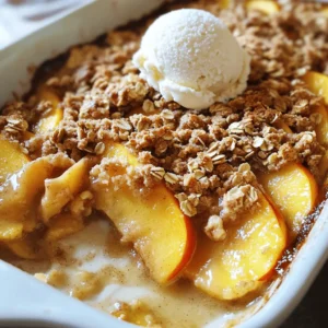 To make a delightful Easy Peach Crisp, you need: - 4 large ripe peaches, peeled and sliced - 1 tablespoon lemon juice - 1/4 cup brown sugar - 1 teaspoon cinnamon - 1 cup rolled oats - 1/2 cup flour (all-purpose or whole wheat) - 1/3 cup granulated sugar - 1/2 cup cold unsalted butter, cubed - 1/2 cup chopped nuts (walnuts or pecans, optional) - Pinch of salt Peaches are the star of this recipe. They need to be ripe for the best taste. Look for peaches that feel slightly soft when you press them. Their sweet juice makes the crisp juicy and flavorful. The lemon juice adds a bit of tang, balancing the sweetness. Brown sugar gives the topping a rich, caramel flavor. Oats provide a crunchy texture that contrasts nicely with the soft peaches. The butter makes the topping crisp and golden. When picking peaches, choose ones that are fragrant. This means they are ripe and ready to eat. Check for smooth skin without any blemishes. If the peach is too hard, it may not be sweet. If it's too soft, it may be overripe. If you can’t find fresh peaches, frozen ones work too. Just thaw them and drain any extra juice before using them. This will keep your crisp from getting soggy. For the best flavor, use peaches in season, which is usually summer. You can find the full recipe for more details on how to prepare your peach crisp! First, gather your ingredients. You need ripe peaches, lemon juice, brown sugar, and more. Next, preheat your oven to 350°F (175°C). This heat will make your crisp golden and yummy. Now, slice your peaches. You want about four large ones. In a big bowl, toss the sliced peaches with one tablespoon of lemon juice. Add a quarter cup of brown sugar and one teaspoon of cinnamon. Mix well until the peaches are coated. Spread this peach mixture into a greased 8x8 inch baking dish. The sweet and tangy flavor will shine through! In another bowl, combine one cup of rolled oats, half a cup of flour, and one-third cup of granulated sugar. Add a pinch of salt to enhance the flavor. Then, take half a cup of cold unsalted butter, cubed. Use your fingers or a pastry cutter to mix it in until it looks like coarse crumbs. If you like, stir in half a cup of chopped nuts for some crunch. Finally, sprinkle this topping evenly over your peach layer in the dish. Baking will bring everything together into a delightful dessert. For the full recipe, check the instructions above! To get a great crisp, focus on your topping. Use cold butter, not melted. This keeps the topping light. Mix until the butter looks like coarse crumbs. This texture gives you that nice crunch. You want the oats to stay whole. If you crush them too much, the topping will be soft. Baking it until golden brown is key. This shows the topping is crispy and ready. One common mistake is using overripe peaches. They can turn mushy in the oven. Make sure your peaches are ripe but firm. Don't skip the lemon juice. It adds flavor and helps keep the peaches bright. Another mistake is packing the topping too tightly. Lightly sprinkle it over the peaches for even cooking. Lastly, keep an eye on the bake time. Ovens vary, so check for golden brown color. Serve your peach crisp warm, right from the oven. It tastes great with a scoop of vanilla ice cream. The cold ice cream melts into the warm crisp. You can also add a dollop of whipped cream. For a twist, drizzle some caramel sauce on top. Pair it with a cup of coffee or tea for dessert. Enjoy it after dinner or as a sweet snack. For more ideas, check the Full Recipe for other fun options! {{image_2}} You can switch up the fruit in your peach crisp for a fun twist. Try using ripe pears, sweet cherries, or tart apples. Each fruit adds its own unique flavor. You can also mix different fruits together. Adding berries, like blueberries or raspberries, brings a nice color and taste. For extra crunch, toss in some nuts. Walnuts and pecans work great for this. Want a lighter version of peach crisp? Use less sugar. You can cut the brown sugar in half. Instead, try honey or maple syrup for a natural sweet taste. For a gluten-free option, swap the flour for almond flour or oat flour. You can also replace the butter with coconut oil. This keeps it rich while making it a bit lighter. Each season brings its own fruit. In summer, use nectarines or plums. In fall, apply apples and pears for a cozy treat. Winter offers citrus fruits like oranges or tangerines. In spring, fresh strawberries can brighten your dish. Seasonal choices not only add flavor but also keep your dessert fresh and exciting. Check out the full recipe to see how easy it is to make this delightful dessert! After you enjoy your peach crisp, store leftovers in an airtight container. This keeps the crisp fresh. Let it cool completely before sealing. You can keep it in the fridge for up to four days. If you like, you can also cover it tightly with plastic wrap. To reheat, warm the peach crisp in the oven. Preheat your oven to 350°F. Place the crisp in an oven-safe dish. Heat for about 10-15 minutes, or until warm. You can also use the microwave for a quick option. Heat in 30-second bursts until warm. If you want to save some peach crisp for later, freezing works well. Cut the crisp into portions. Wrap each piece in plastic wrap and then in foil. Label and date the packages. You can freeze it for up to three months. To eat, thaw it in the fridge overnight. Then, reheat as described earlier for a tasty dessert anytime. To make Easy Peach Crisp vegan, swap the butter for a plant-based alternative. Use coconut oil or a vegan butter substitute. This change keeps the flavor rich while making it dairy-free. You can also replace the granulated sugar with coconut sugar for a healthier option. Yes, you can use frozen peaches for this recipe. Thaw them first and drain excess liquid. This step helps prevent a soggy crisp. Keep in mind that frozen peaches may be softer than fresh ones, so adjust the baking time slightly if needed. For gluten-free options, use certified gluten-free oats and almond flour instead of regular flour. You can also try coconut flour or a gluten-free blend. These options will still give you that lovely crisp topping you crave without any gluten. Easy Peach Crisp is a simple dessert that highlights fresh peaches. You learned how to choose the best peaches and prepare a tasty topping. I shared tips to get the perfect crisp and avoid common mistakes. You can also explore variations and healthier options. In short, this recipe lets you enjoy delicious flavors with ease. Try it and impress your friends and family. Happy baking!