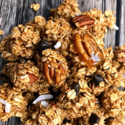 For the best maple pecan granola clusters, gather these key ingredients: - 2 cups rolled oats - 1 cup pecans, roughly chopped - 1/2 cup unsweetened shredded coconut - 1/4 cup honey - 1/4 cup maple syrup - 1/2 teaspoon vanilla extract - 1/2 teaspoon cinnamon - 1/4 teaspoon salt These ingredients create the perfect balance of crunch and sweetness. The rolled oats form a solid base, while pecans add rich flavor. Shredded coconut brings a lovely chewiness, and the honey and maple syrup bind everything together. Feel free to customize your granola clusters with these optional add-ins: - 1/4 cup mini chocolate chips - Dried fruit like cranberries or raisins - Seeds such as pumpkin or sunflower Adding mini chocolate chips can turn your snack into a treat. Dried fruit adds a sweet burst, while seeds boost nutrition. You can mix and match based on your preferences. Each serving of maple pecan granola clusters provides a tasty and healthy snack. Here’s a quick look at the nutrition: - Calories: Approx. 180 - Protein: 4g - Carbohydrates: 25g - Fat: 8g - Fiber: 3g These clusters are not only delicious but also nourishing. They offer a good mix of healthy fats and fiber, making them a great choice for energy throughout the day. Enjoy guilt-free snacking! First, set your oven to 350°F (175°C). This heat helps make the granola crunchy. Next, take a large baking sheet and line it with parchment paper. This step keeps the granola from sticking. It also makes cleanup easy. Grab a large mixing bowl. In it, combine 2 cups of rolled oats, 1 cup of roughly chopped pecans, and 1/2 cup of unsweetened shredded coconut. Stir these ingredients well. You want them mixed evenly. This blend gives the granola its great texture. Now, take a small saucepan. Over low heat, whisk together 1/4 cup of honey, 1/4 cup of maple syrup, 1/2 teaspoon of vanilla extract, 1/2 teaspoon of cinnamon, and 1/4 teaspoon of salt. Warm this mixture for about 2-3 minutes. It should blend well, creating a sweet syrup. Pour the warm syrup mixture over the oat mixture. Stir it all together until the dry ingredients are well coated. This coating is key to forming clusters. Once mixed, transfer the mixture to your lined baking sheet. Spread it evenly and use a spatula to press it down firmly. This step helps form those tasty clusters. Bake the mixture in your preheated oven for 20-25 minutes. Halfway through, toss it to ensure even baking. You'll know it's done when it's golden brown. Once baked, remove it from the oven and let it cool completely on the baking sheet. Cooling is vital for cluster formation. Once cool, break the granola into clusters. If you want, fold in some mini chocolate chips for an extra treat. Store the granola in an airtight container for up to two weeks. To make perfect clusters, you need to press the mixture firmly. After mixing the oats, pecans, and coconut with the syrup, spread it out on the baking sheet. Use the back of a spatula to press it down. The tighter you pack it, the better the clusters will form. Bake until golden brown, then let it cool fully. This cooling step is key. It helps the clusters stick together and stay crunchy. Store your granola clusters in an airtight container. This keeps them fresh for up to two weeks. If you want to keep them longer, consider freezing them. Just make sure to use a freezer-safe bag or container. When you want to enjoy some, let them thaw at room temperature. They'll taste just as good. These granola clusters are great on their own. You can also enjoy them with yogurt or milk. Try them on top of a smoothie bowl for extra crunch. For a sweet treat, add some fresh berries or sliced bananas. You can even sprinkle a few mini chocolate chips on top for a fun twist. {{image_2}} You can swap pecans for other nuts or seeds. Almonds, walnuts, and cashews work well. For seeds, try sunflower or pumpkin seeds. Each choice gives a new taste. Mix and match to find your favorite blend. If you want to change the sweetener, use agave or brown rice syrup. These add unique flavors. You can also reduce honey or maple syrup for less sweetness. Just keep the same amount of liquid. Spices add great depth to your granola. Consider adding nutmeg or ginger for warmth. You can also use almond or maple extract for extra flavor. Just a little goes a long way. Adjust the amount based on your taste. If you prefer store-bought granola clusters, some brands stand out. I recommend brands like Nature Valley and KIND. They offer tasty options that often include maple and pecan flavors. Check the labels to find ones with whole ingredients. Look for low sugar options to keep it healthy. You can find maple pecan granola clusters online, too. Websites like Amazon and Thrive Market have many choices. Search for brands like Bob's Red Mill or Cascadian Farm. They often provide detailed ingredient lists. This helps you choose the best option for your taste. Visit your local health food store for more choices. Stores like Whole Foods and Sprouts usually have a great selection. They often carry organic and local brands. You can also ask staff for recommendations. They know which products are best sellers. Plus, you can find fresh granola that might not be available online. Yes, you can make these clusters gluten-free. Use certified gluten-free rolled oats. Most brands offer these oats. Check the label to ensure they meet gluten-free standards. Homemade granola clusters can last up to two weeks. Store them in an airtight container. This keeps them fresh and crunchy. If you want to make a larger batch, consider freezing them for longer storage. Absolutely! You can swap pecans for almonds or walnuts. You can also add dried fruits like cranberries or raisins. This adds flavor and nutrition. Be creative with your choices to suit your taste. Granola clusters are packed with nutrients. They provide fiber, healthy fats, and protein. This mix helps keep you full longer. Plus, they are a great source of energy for snacks or breakfast. Enjoy a handful for a tasty boost! You learned how to make tasty maple pecan granola clusters. We discussed essential ingredients, cooking steps, and helpful tips to get the best clusters. Remember, you can switch nuts or sweeteners to suit your taste. Use fresh ingredients for the best flavor and crunch. Enjoy this healthy snack on its own or with yogurt. Experiment and create your perfect blend. Your kitchen adventures can lead to great snacks! Let's get cooking and enjoy this delightful treat together!